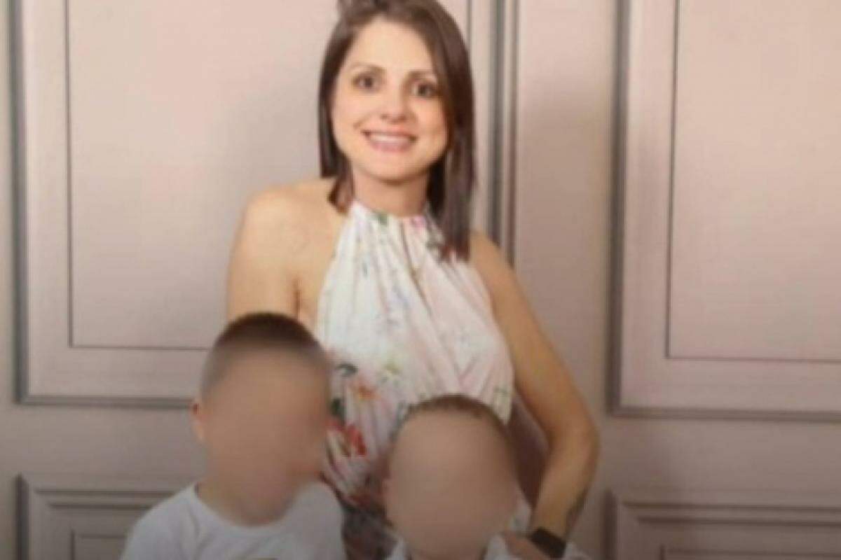 Edinéia Telles, de 34 anos, e seus dois filhos 