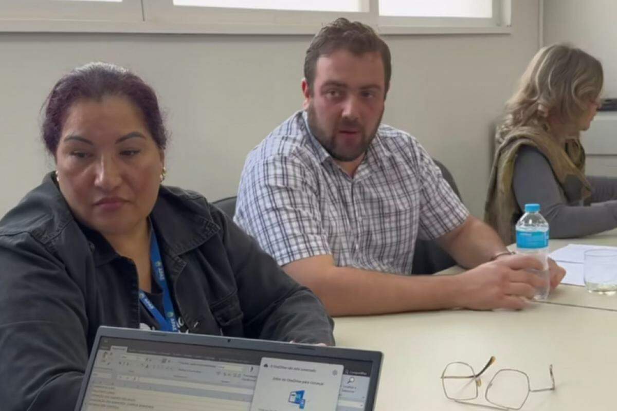 Claudia Lobo e Roberto Franceschetti em reunião semanas antes do homicídio