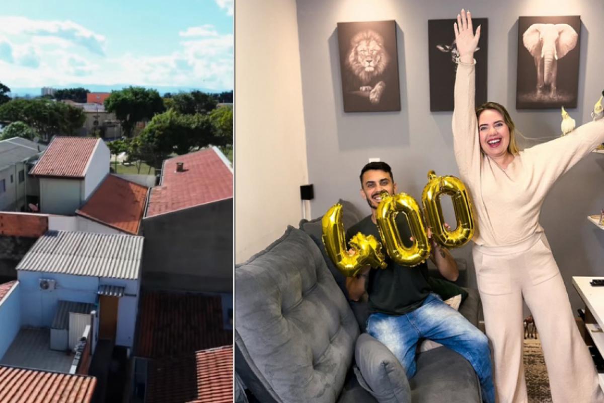 Vista da casinha de 25 m² e o casal na sala do imóvel, celebrando 400 mil seguidores