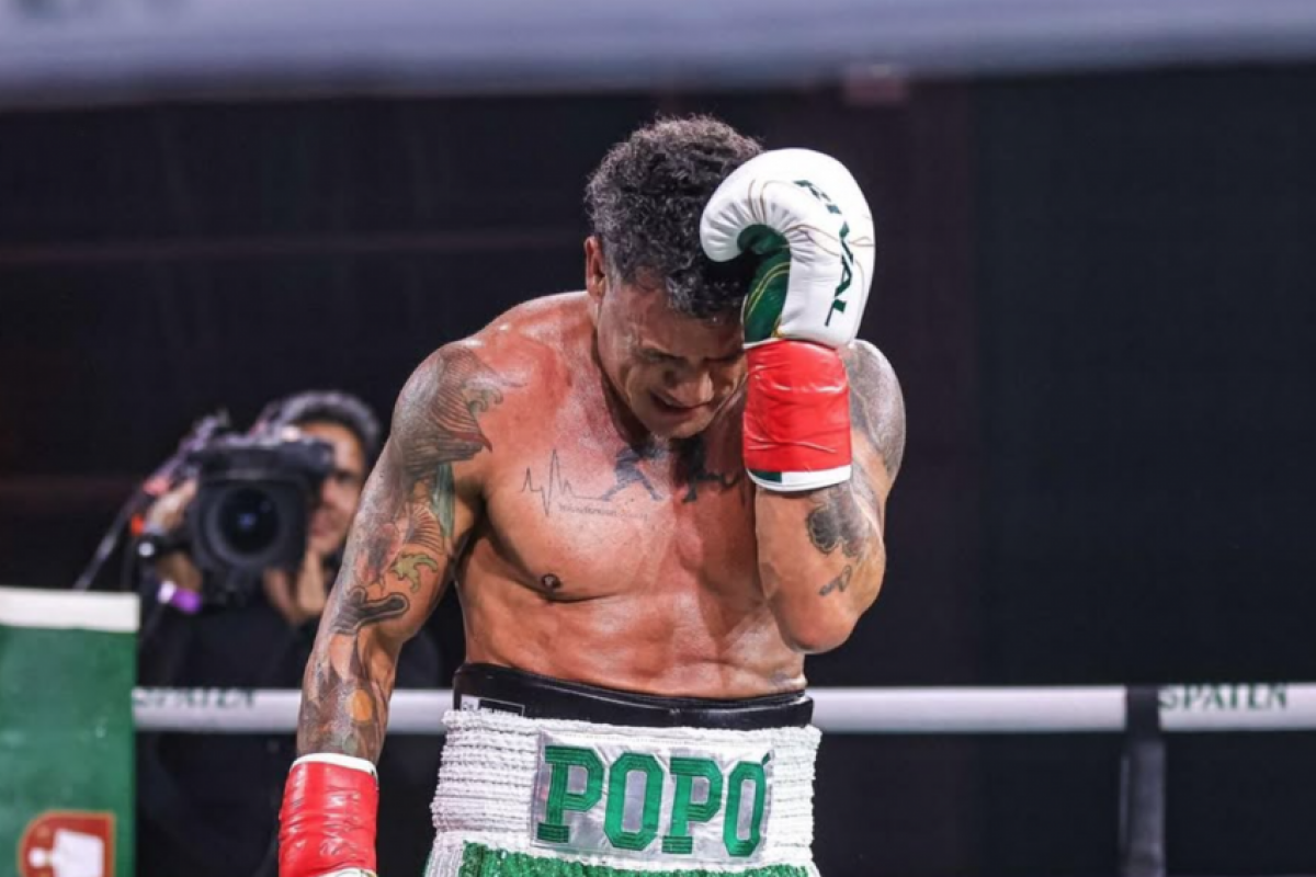  Wanderlei começou pressionando Popó, mas recebeu advertências por golpes ilegais.