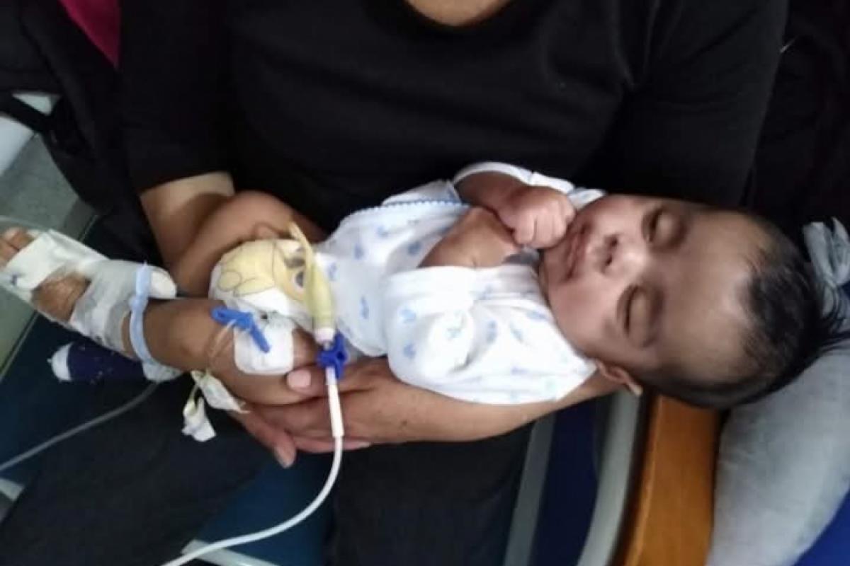 Miguel, de 6 meses, lutando pela vida