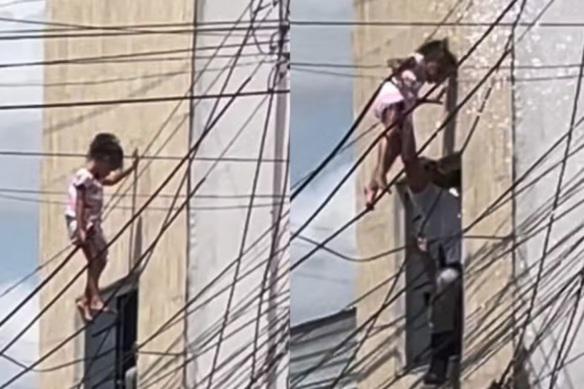 Um policial militar que passava pelo local usou escada, com ajuda de outro homem, para alcançar a menina e retirá-la dos fios.